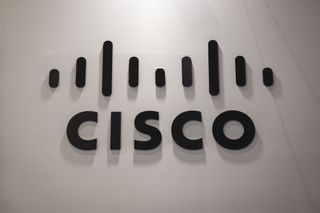 Cisco logo sits illuminated outside the Cisco booth at ISE 2024 on January 30, 2024 in Barcelona, Spain.