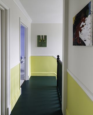 hallwy with green floor and yellow walls