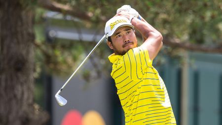 Hideki Matsuyama plays his shot during the Travelers Championship.