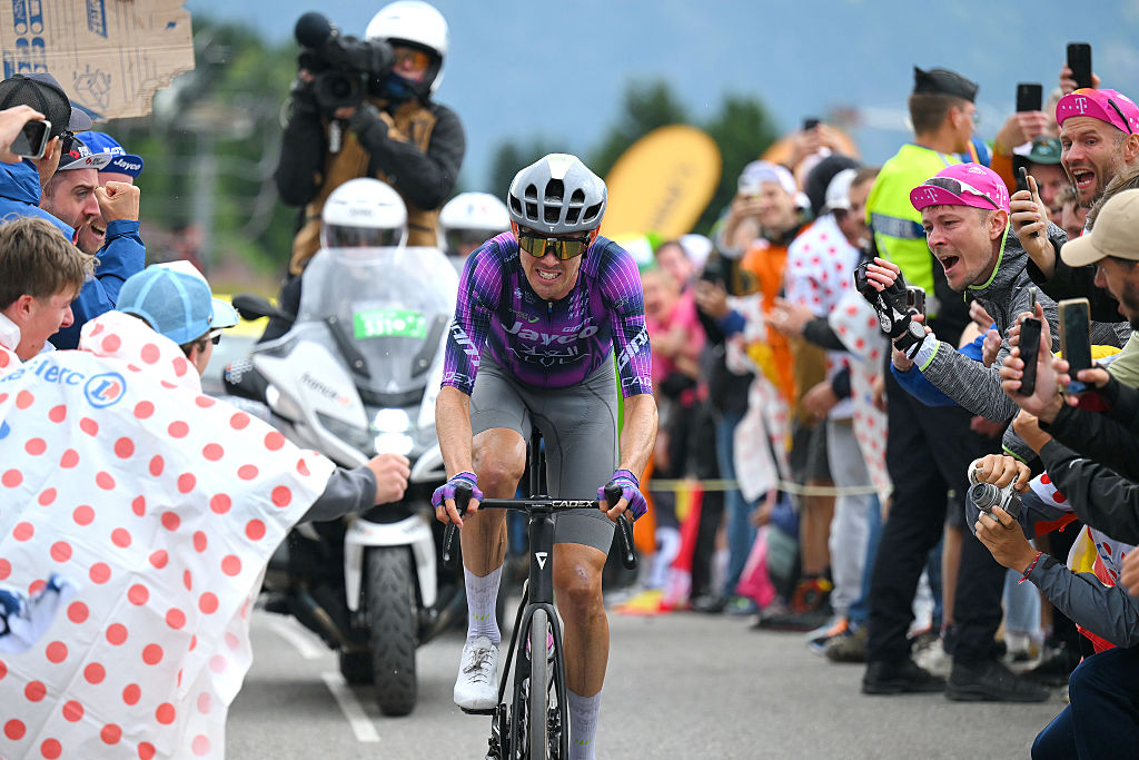 COURCHEVEL - COL DE LA LOZE, FRANCE - JULY 24: Stage winner Ben O'Connor of Australia and Team Jayco AlUla competes climbing the Col de la Loze while fans cheer during the 112th Tour de France 2025, Stage 18 a 171.5km stage from Vif to Courchevel - Col de la Loze 2298m / #UCIWT / on July 24, 2025 in Courchevel - Col de la Loze, France. (Photo by Tim de Waele/Getty Images