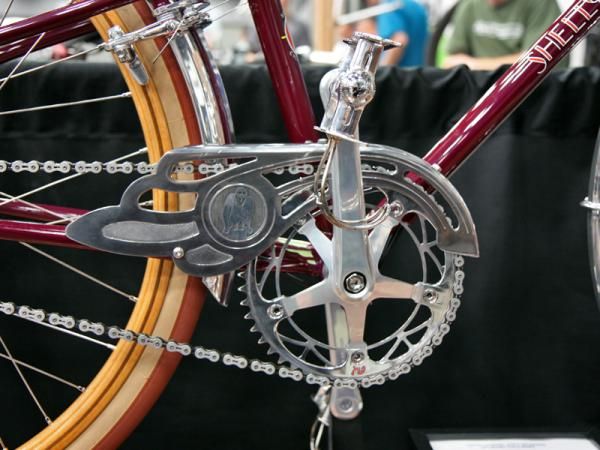 Brett Horton says the inspiration for both bikes came from this vintage CLB chain guard, which was modified with The Horton Collection logo, deburred, and polished.