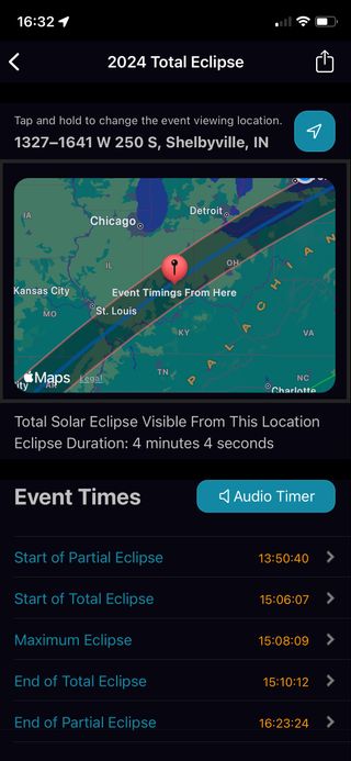 a visualização de um telefone com uma faixa de eclipse e um ponto no mapa.  abaixo estão horários diferentes para eclipse máximo, fim do eclipse total e fim do eclipse parcial