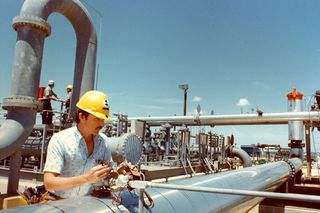 A technician inspects gauge on meter station at the Reserve's Bryan Mound site near Freeport, TX. Credit: DOE