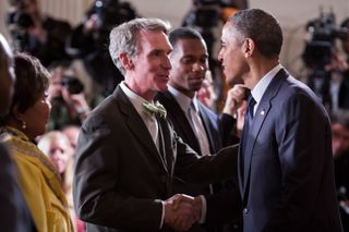 Planetary Society CEO Bill Nye speaking with President Barack Obama at the 2013 White House Science Fair in April 2013.