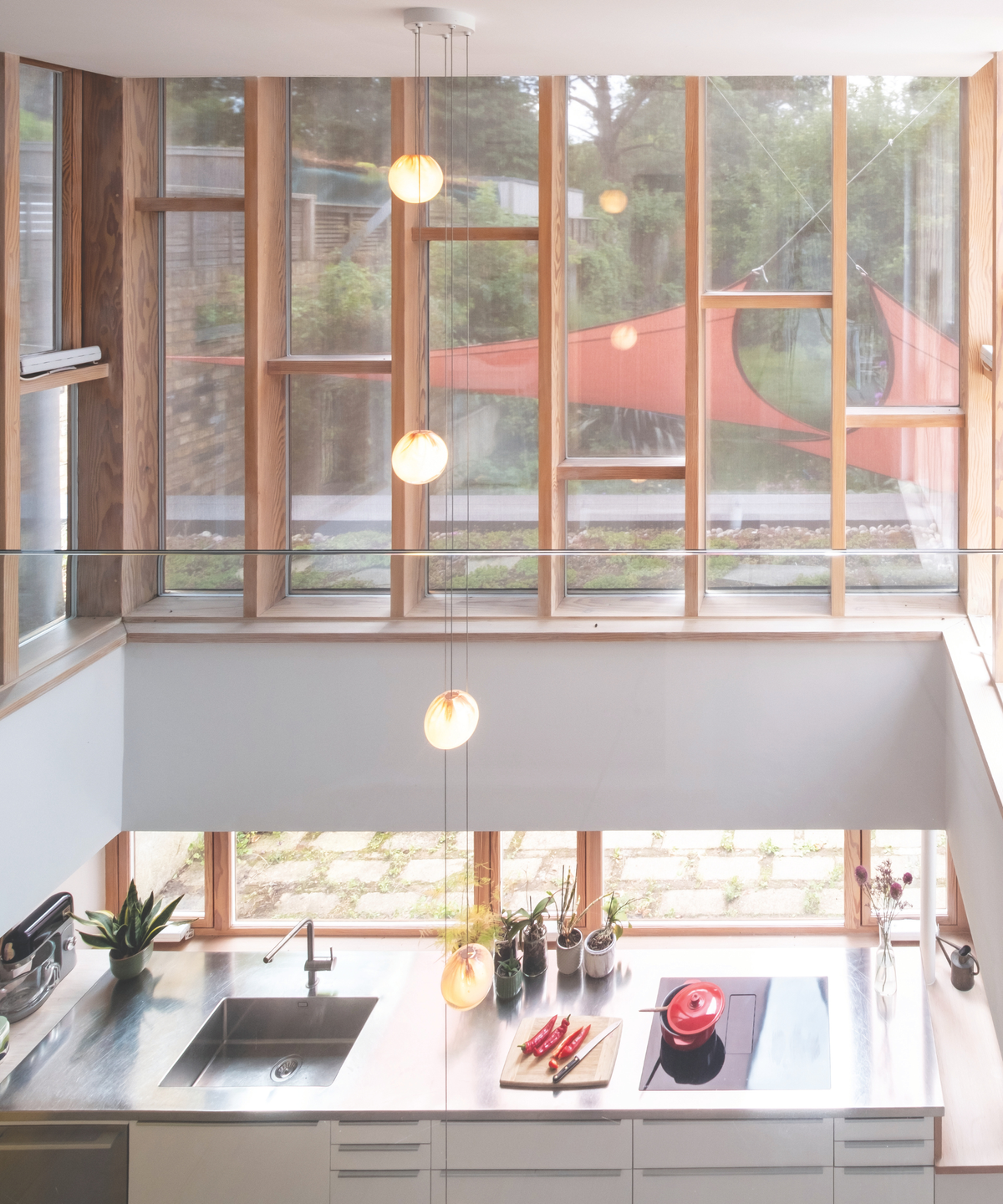 View from the top floor overlooking down onto the kitchen and windows onto the garden