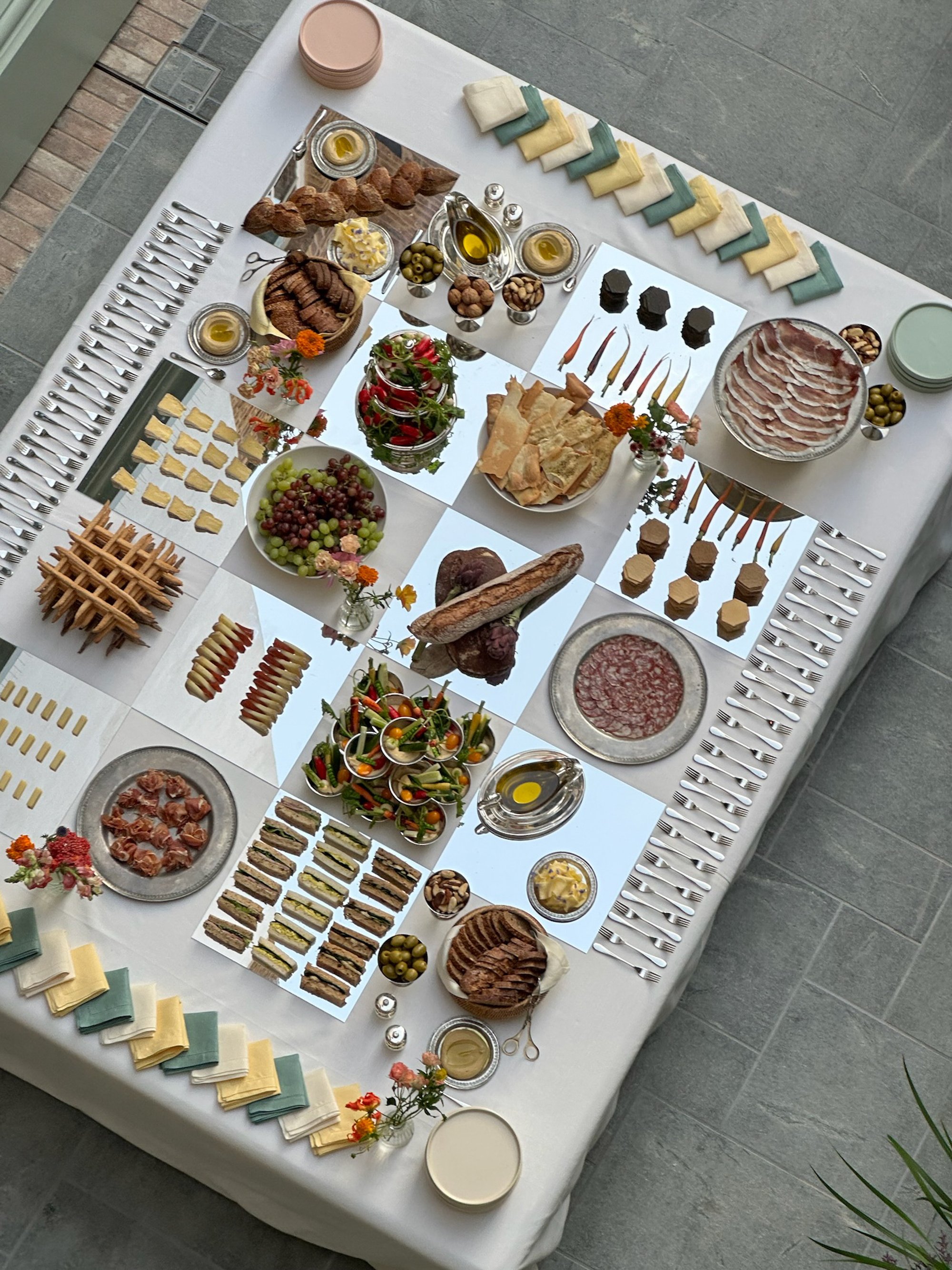 a mirrored chequerboard table styled with food