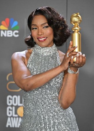 Angela Bassett poses with the award for Best Supporting Actress - Motion Picture at the 2023 Golden Globes