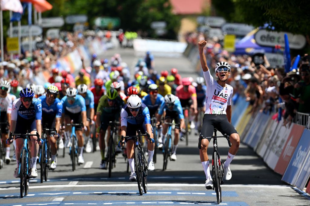 Isaac Del Toro (UAE Team Emirates) celebrates at finish line as stage 2 winner