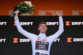 GUMERACHA AUSTRALIA JANUARY 21 Matthew Brennan of The United Kingdom and Team Visma Lease A Bike celebrates at podium as White best young jersey winner during the 25th Santos Tour Down Under 2025 Stage 1 a 1507km stage from Prospect to Gumeracha 342m UCIWT on January 21 2025 in Gumeracha Australia Photo by Dario BelingheriGetty Images