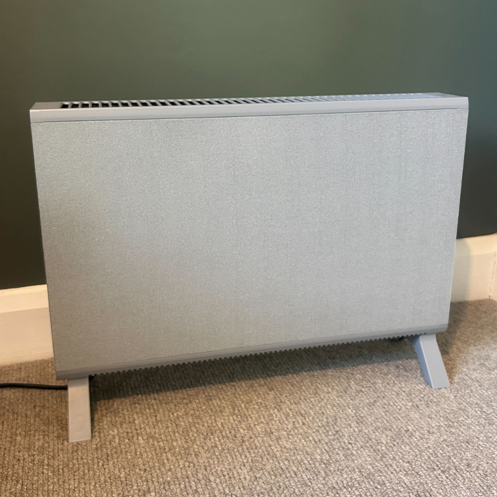 HeatLite Tex Convector Heater against green wall