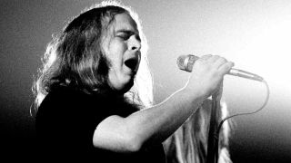 Lynyrd Skynyrd’s Ronnie Van Zant performing onstage in 1974