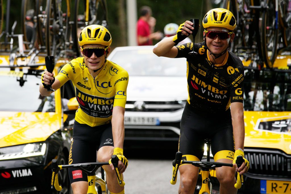 PARIS FRANCE JULY 23 LR Jonas Vingegaard of Denmark Yellow Leader Jersey and Sepp Kuss of The United States and Team JumboVisma celebrate with champagne during the stage twentyone of the 110th Tour de France 2023 a 11 51km stage from SaintQuentinenYvelines to Paris UCIWT on July 23 2023 in Paris France Photo by Daniel Cole PoolGetty Images