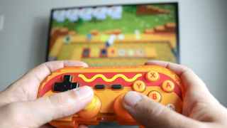 Playing Overcooked on the Switch with one of Hyperkin's new Pixel Art controllers