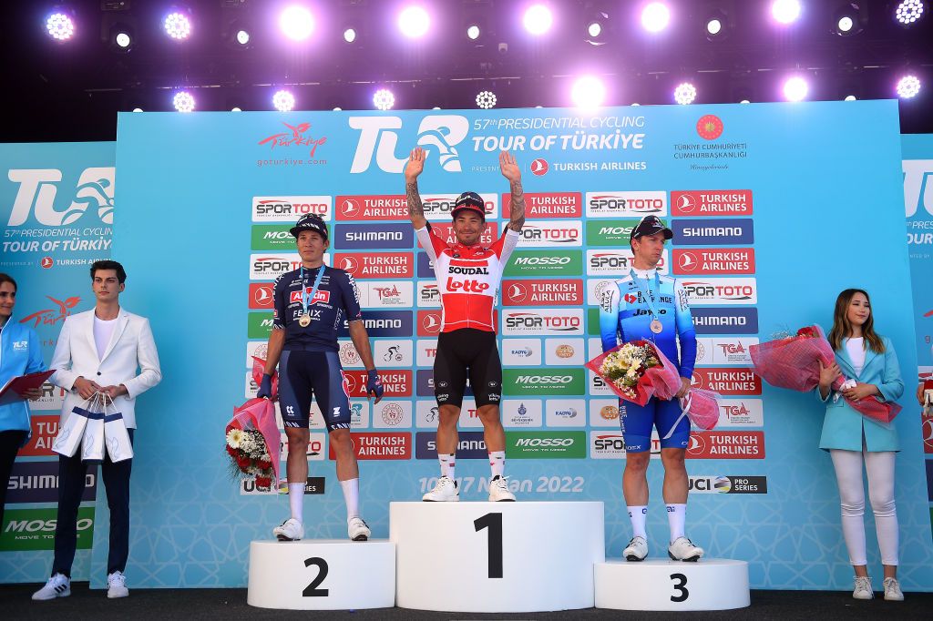 KUSADASI TURKEY APRIL 10 LR Jasper Philipsen of Belgium and Team AlpecinFenix on second place stage winner Caleb Ewan of Australia and Team Lotto Soudal and Kaden Groves of Australia and Team Bikeexchange Jayco on third place pose on the podium ceremony after the 57th Presidential Cycling Tour Of Turkey 2021 Stage 1 a 202km stage from Bodrum to Kuadas TUR2022 on April 10 2022 in Kusadasi Turkey Photo by Dario BelingheriGetty Images