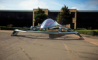 Flying car in a car park