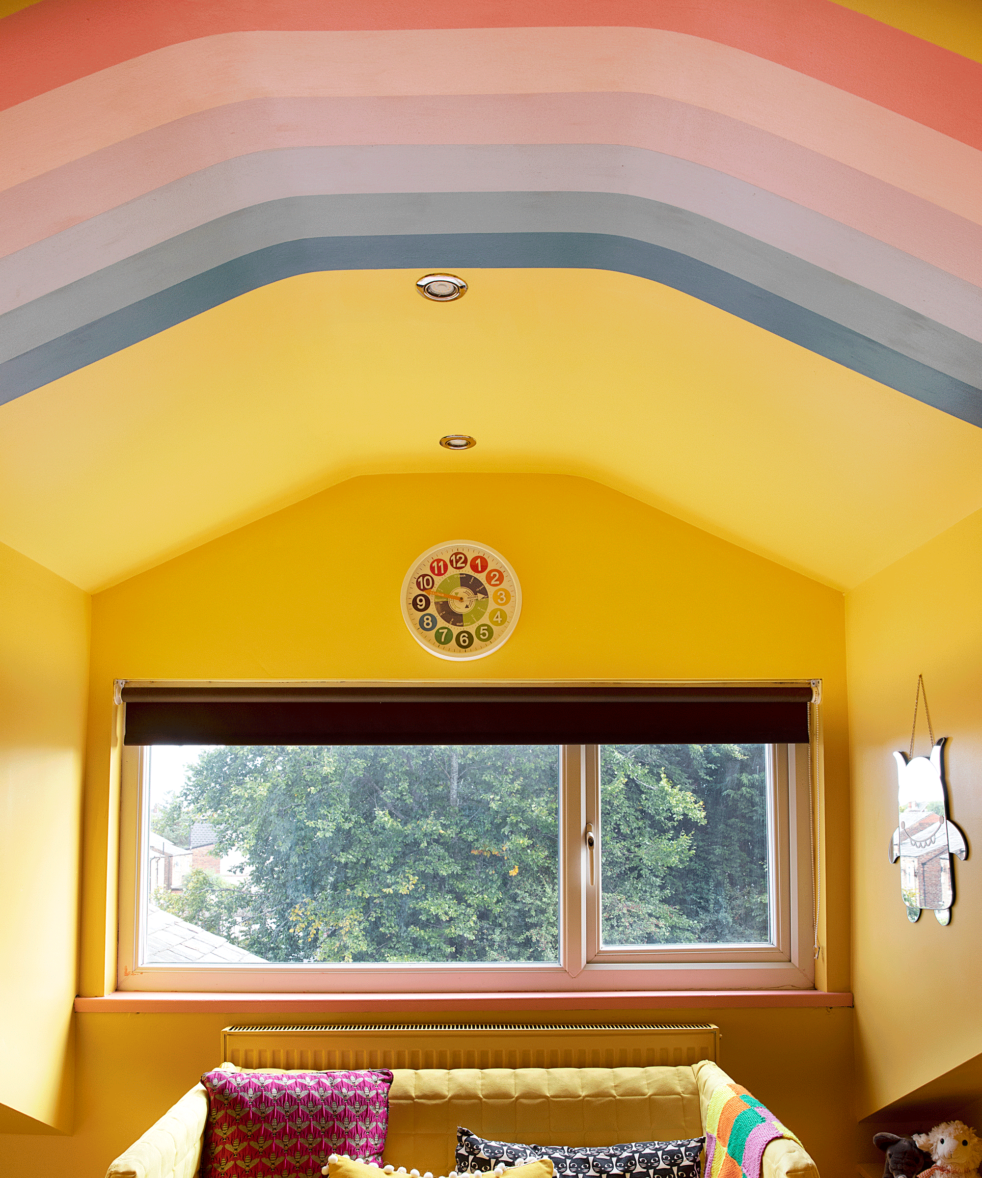 Karen Clough used left over paint to create a rainbow bedroom for less than £100