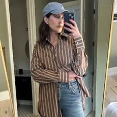 Who What Wear senior fashion editor Allyson Payer trying on the Citizens of Humanity 90s French Jeans in Dirty Martini