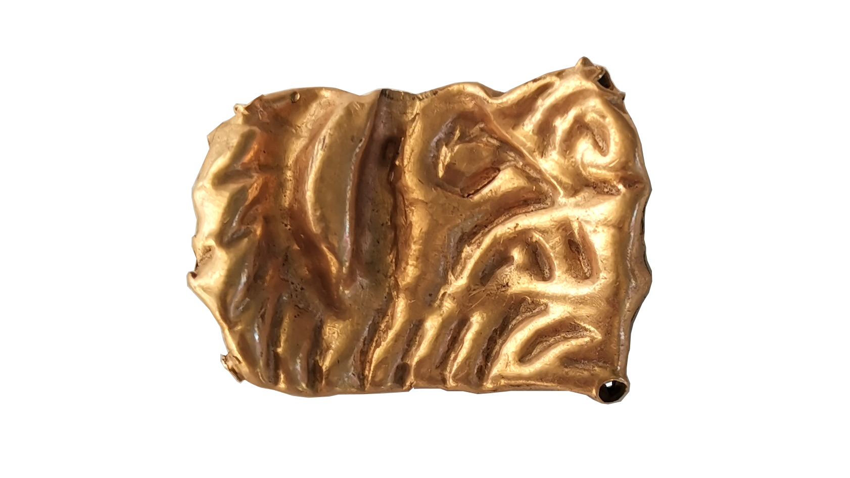a fragment of a gold plaque in the shape of a tiger