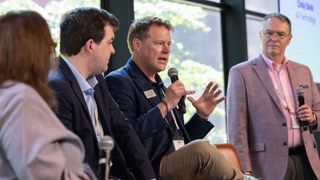 Mark J. Pescatore hosts a panel on pain points and AI at the 2025 AV/IT Summit.