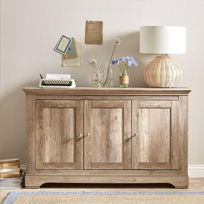 hallway with wooden sideboard