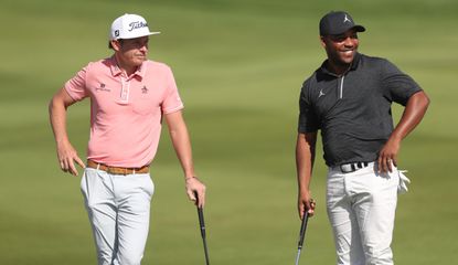 Smith and Varner III chat on the green