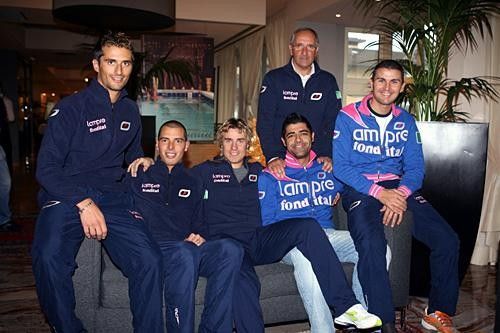 The riders pose with team director Giuseppe Martinelli.
