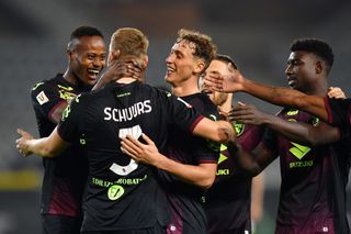 Perr Schuurs of Torino FC celebrates with teammates after scoring their team's third goal during the Coppa Italia match between Torino FC and Cittadella at Olimpico Stadium on October 18, 2022 in Turin, Italy.