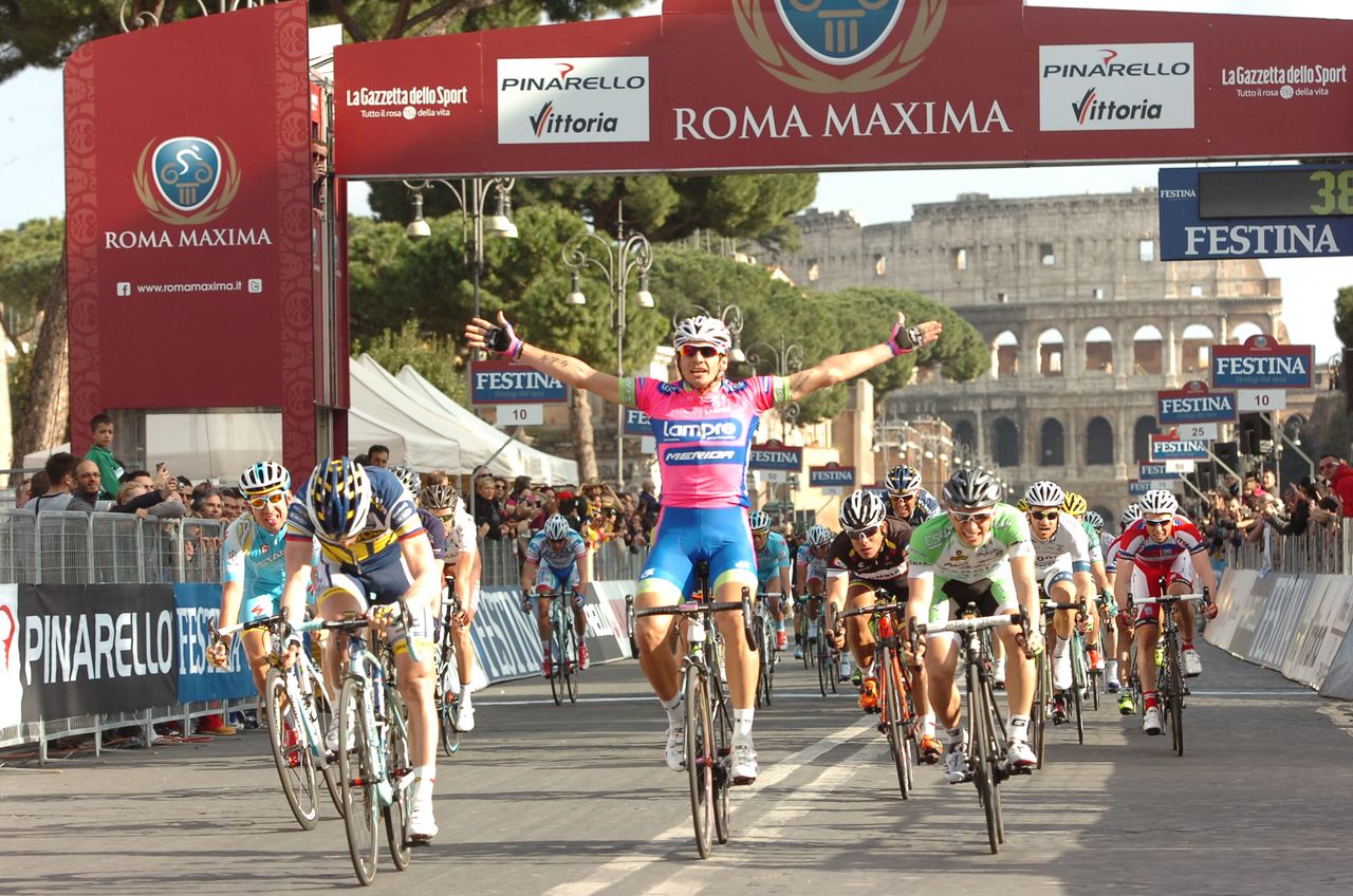 Filippo Pozzato mistakenly believes he has won the 2013 Roma Maxima, not realising the break has stayed clear.