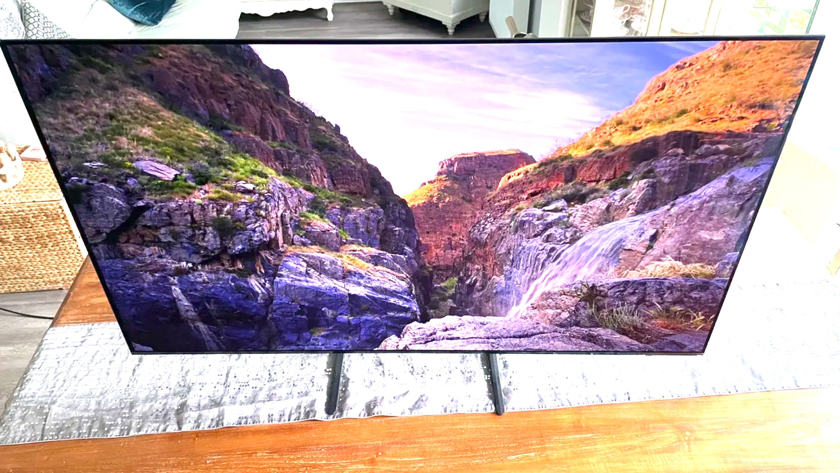 Samsung S90C OLED showing image of mountainside