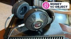 Focal Utopia headphones on headphone amp