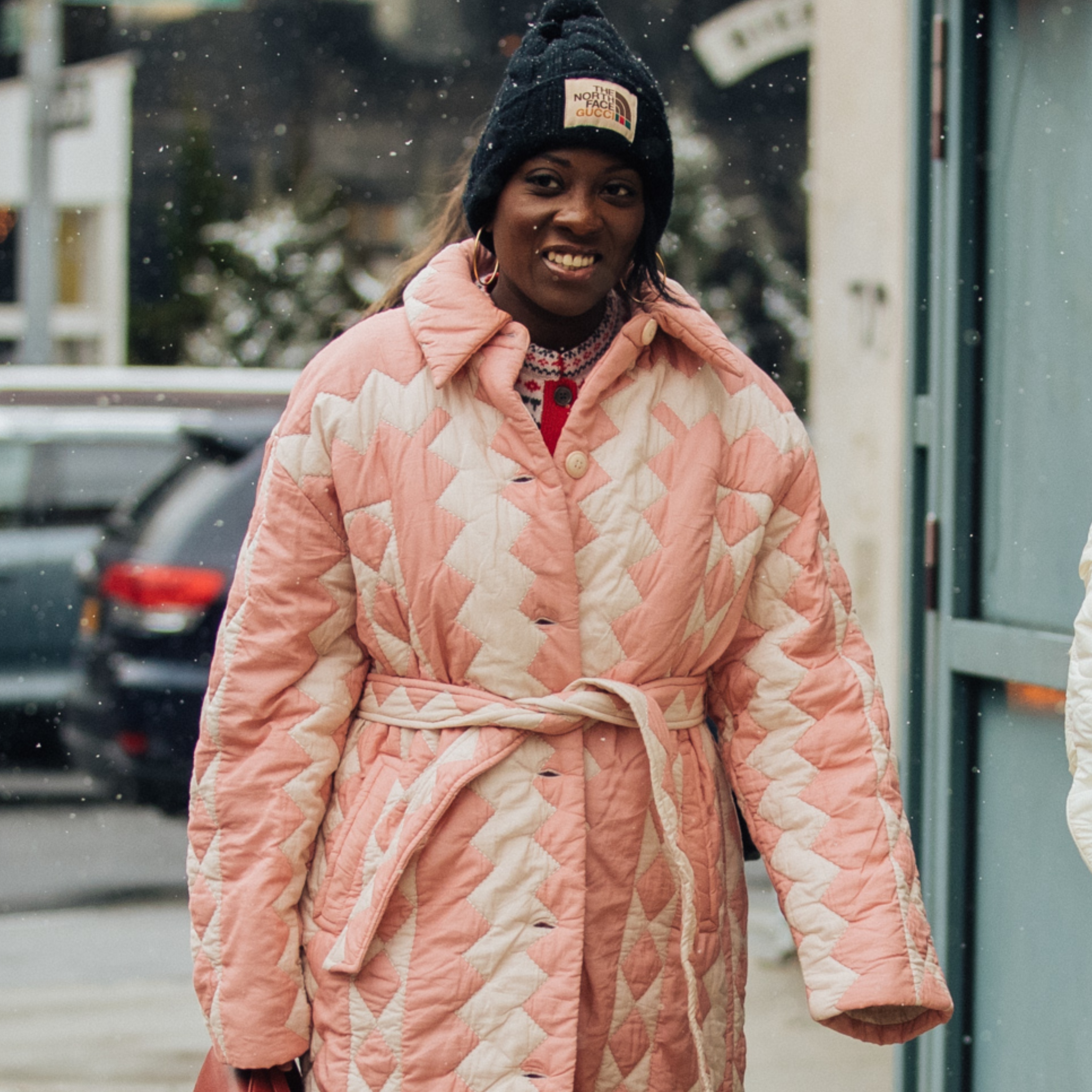 Nikki Ogunnaike wearing a pink coat 