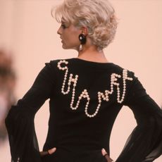 Linda Evangelista walks the Chanel ready to wear runway Paris Fashion Week Fall/Winter March, 1991