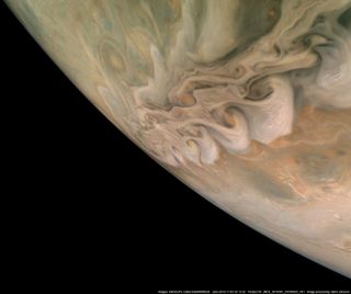 From NASA: NASA's Juno spacecraft captured this impressive image revealing a band of swirling clouds in Jupiter's northern latitudes during Juno's close flyby on Nov. 3, 2019. Small pop-up storms can also be seen rising above the lighter areas of the clouds, most noticeably on the right side of the image.