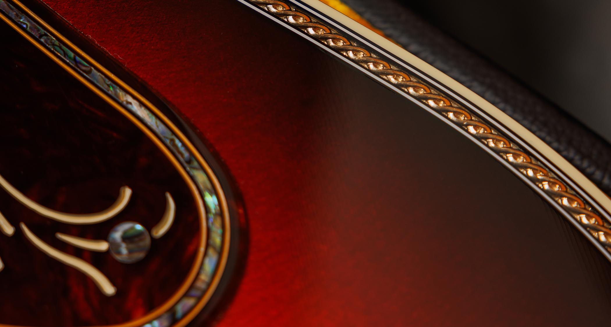 Gibson Custom SJ-200 Monarch #100: this stunning one-of-one jumbo is replete with all kinds of rococo flourishes, from the diamond and gold crown inlay on the headstock, to the 14k gold rope binding, Gibson calls it the &quot;ultimate custom&quot; acoustic and not without some justification.