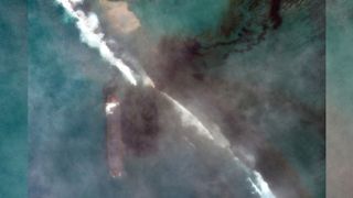 A bulk carrier ship, MV Wakashio, that recently ran aground off the southeast coast of Mauritius has been spilling oil into the sea, as seen in satellite images captured by Maxar Technologies on Aug. 7, 2020.