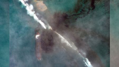 A bulk carrier ship, MV Wakashio, that recently ran aground off the southeast coast of Mauritius has been spilling oil into the sea, as seen in satellite images captured by Maxar Technologies on Aug. 7, 2020.