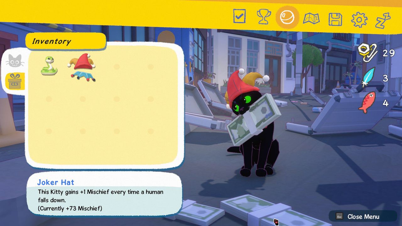 Kitty wears a Joker hat from Balatro and holds money in his mouth