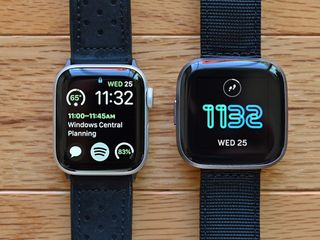 Apple Watch Series 4 (left) vs. Fitbit Versa 2 (right).