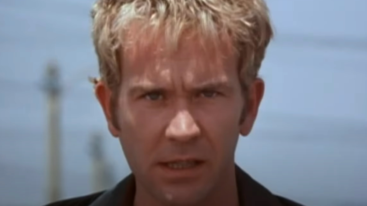Timothy Hutton scowling in Playing God