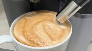 Image showing a cup of frothy coffee with a thick crema made by the Nespresso Vertuo Lattissima machine
