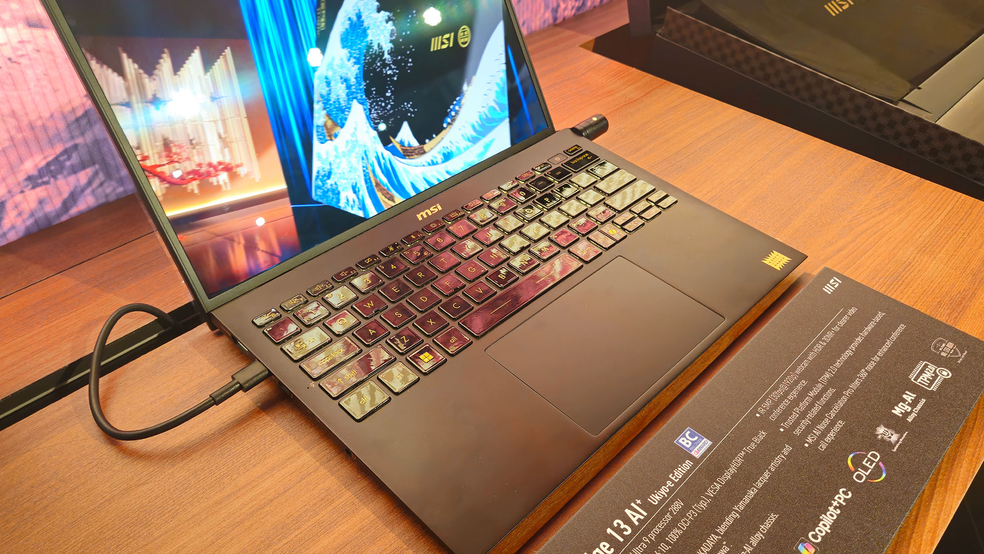 The MSI Prestige 13+ AI Ukiyo-e Edition laptop on display at Computex 2025