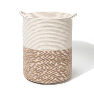 A dual toned woven laundry basket