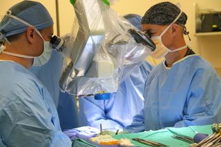 Doctors at UF Health Cancer Center - Orlando Health perform surgery