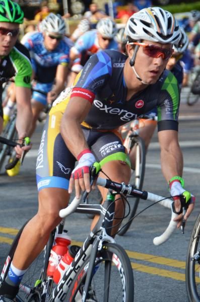 An Exergy Rider concentrates while sitting in the field.