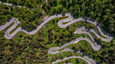 Aerial view of a very winding road.