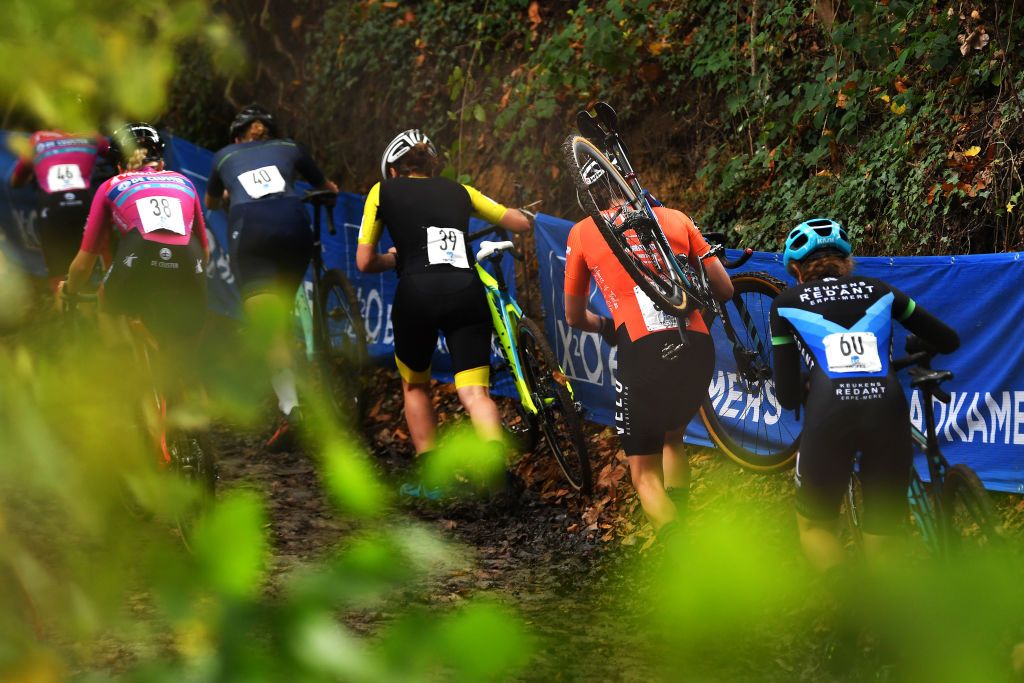 OUDENAARDE BELGIUM NOVEMBER 01 Cisek Corey Coogan of The United States Velorevolution Wpcycles and The Peloton compete during the 32nd Koppenbergcross Grand Prix Jolien Verschueren 2021 Womens Elite Koppenbergcross Oudenaarde X2OBadkamersTrofee on November 01 2021 in Oudenaarde Belgium Photo by Luc ClaessenGetty Images