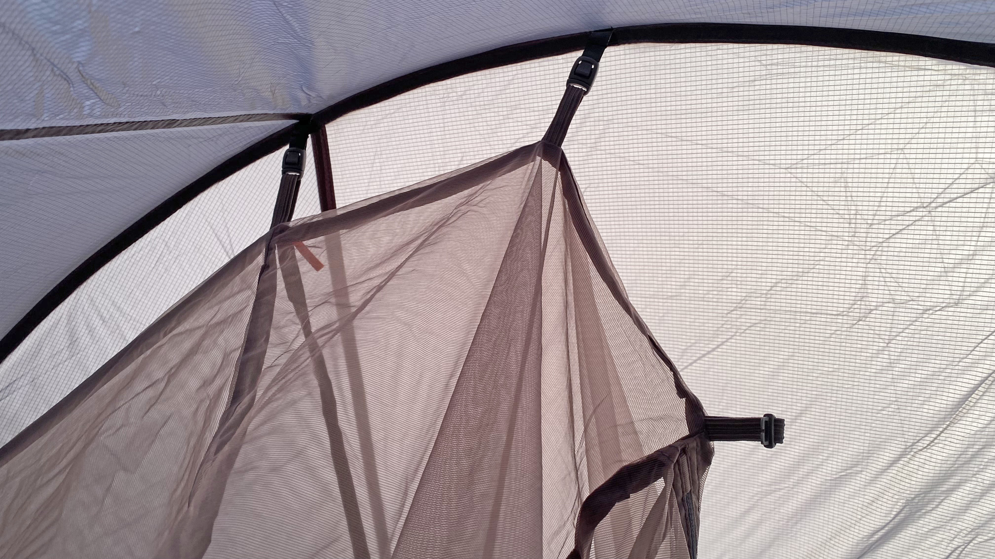 Clipping the inner tent to the pitched fly on the Solo Peak