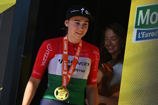 AMNEVILLE FRANCE AUGUST 15 Blanka Vas of Hungary and Team SD Worx Protime celebrates at podium as stage winner during the 3rd Tour de France Femmes 2024 Stage 5 a 1522km stage from Bastogne to Amneville UCIWWT on August 15 2024 in Amneville France Photo by Dario BelingheriGetty Images