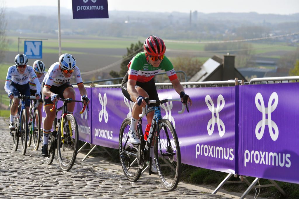 OUDENAARDE BELGIUM APRIL 04 Elisa Longo Borghini of Italy and Team Trek Segafredo Lisa Brennauer of Germany and Ceratizit WNT Pro Cycling Team Marta Cavalli of Italy and Team FDJ Nouvelle Aquitaine Futuroscope during the 18th Ronde van Vlaanderen Tour of Flanders 2021 Womens Elite a 1524km race frim Oudenaarde to Oudenaarde Paterberg Cobblestones sector RVV21 rondevanvlaanderen tourofflanders UCIWWT on April 04 2021 in Oudenaarde Belgium Photo by Luc ClaessenGetty Images
