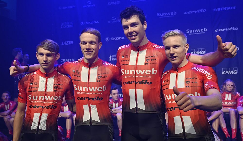 Lennard Kaemna, Nikias Arndt, Max Walscheid and Max Kanter pose for the media during the 2019 Sunweb cycling team's official presentation on January 3, 2019 in Berlin